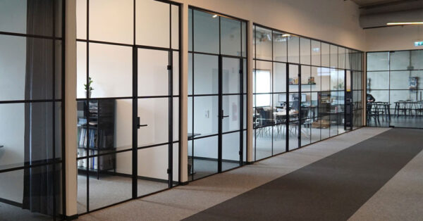 Glass partition with a black frame